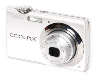 Nikon CoolPix S225 digital camera on white background.