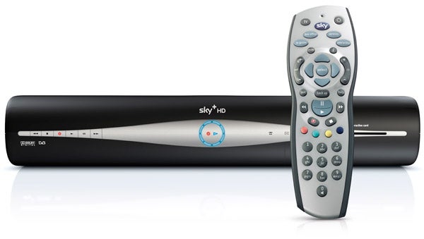 Sky+HD box and remote control on white background.