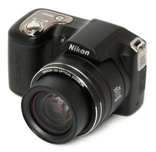 Nikon Coolpix L100 digital camera on white background.