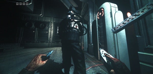 Screenshot of Chronicles of Riddick game showing first-person combat.