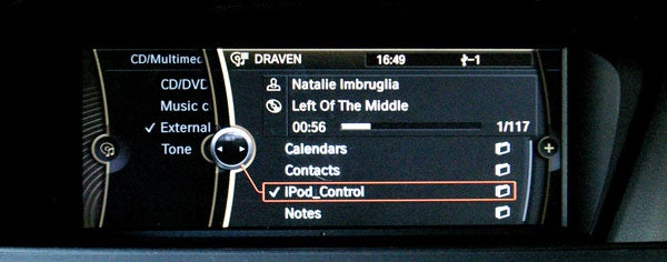 BMW 330d M Sport ConnectedDrive interface showing multimedia options.