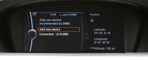BMW ConnectedDrive screen showing pairing completed message and GPS coordinates.BMW 330d M Sport ConnectedDrive screen showing device connectivity options.