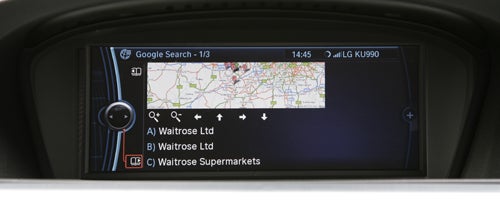 BMW 330d M Sport ConnectedDrive screen showing navigation map.