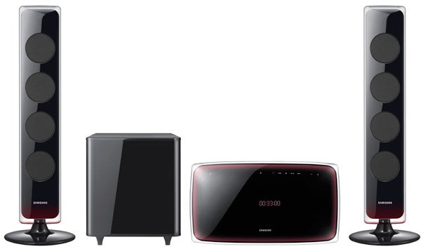 Samsung HT-X720G home cinema system with two speakers and subwoofer.