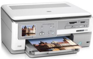 HP Photosmart C8180 All-in-One printer with photo printouts.