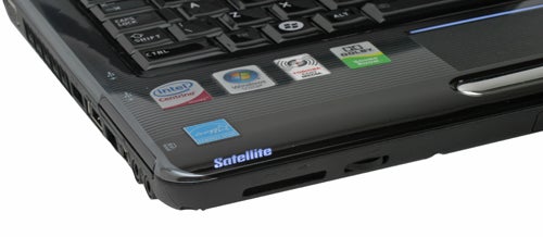 Close-up of Toshiba Satellite U400-189 notebook with stickers on palm rest.