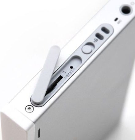 Close-up of iRiver P7 8GB media player's side buttons and ports.