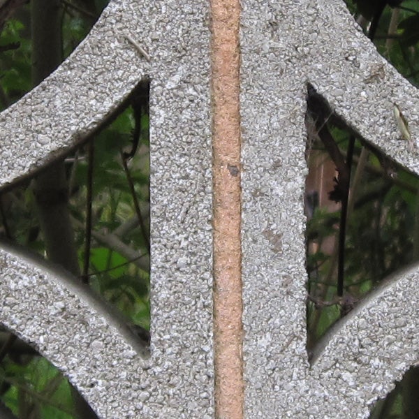 Close-up of a rusty metal object with textured surface