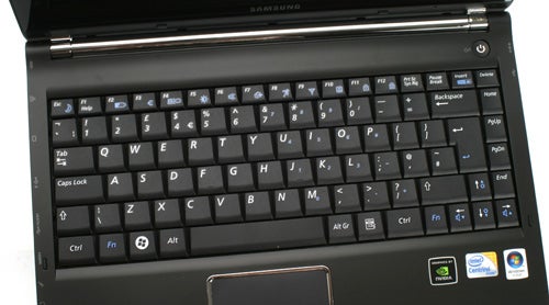 Close-up of Samsung Q320 laptop keyboard and trackpad.