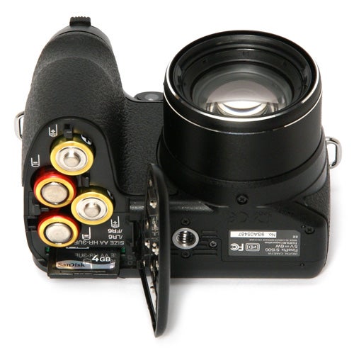 Fujifilm FinePix S1500 camera showing battery compartment.
