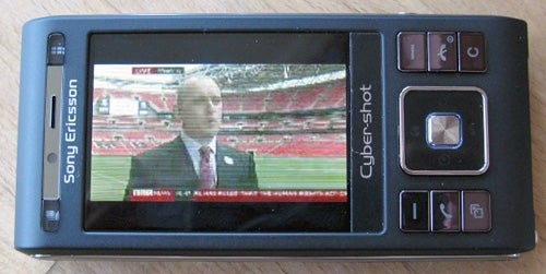 Sony Ericsson Cyber-shot C905 Plus phone displaying a video.