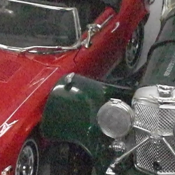 Low-resolution photo of vintage cars taken with Samsung NV100HD.