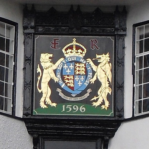 Coat of arms with lions and a crown, dated 1596.