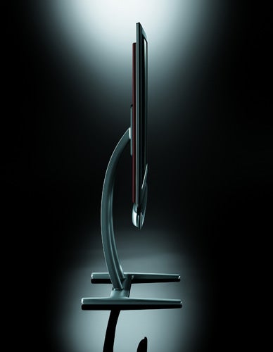 Side profile of Sharp Aquos LC-52XS1E LCD TV on stand.