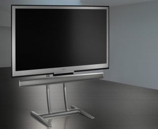 Sharp Aquos LC-52XS1E LCD TV on modern silver stand.