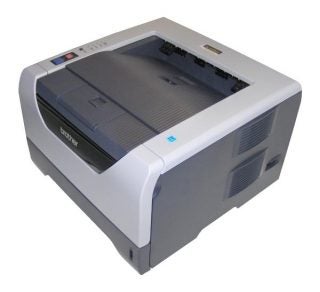 Brother HL-5370DW Mono Laser Printer on a table.