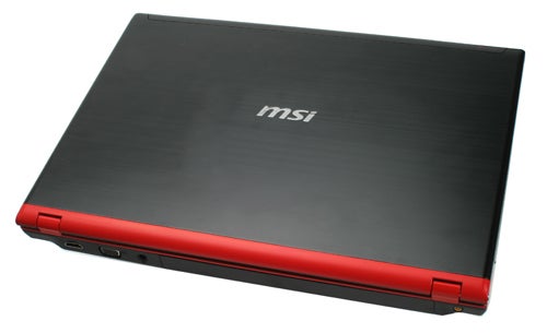 MSI GT627-246UK gaming laptop with black and red cover.