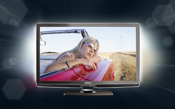 Philips 32PFL9604 LCD TV displaying vibrant car scene.