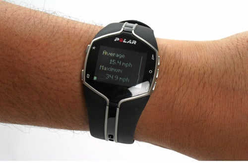 Polar FT80 fitness watch displaying speed on a wrist.