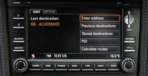 Porsche Cayman navigation system interface with options displayed.