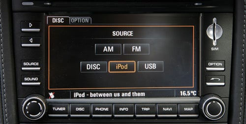 Porsche Cayman's infotainment system displaying audio sources.