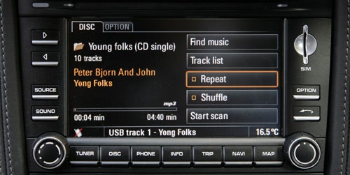 Porsche Cayman infotainment system displaying audio options.