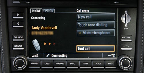 Porsche Cayman infotainment system during a phone call.