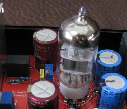 Tube amplifier vacuum tube close-up with circuit board
