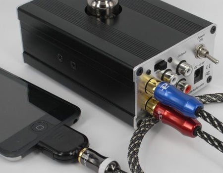 Trends PA-10 Tube Headphone Amplifier with connected smartphone.