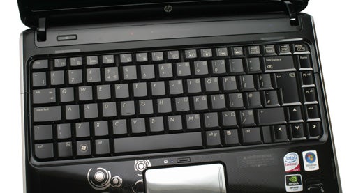 HP Pavilion dv3-2055ea laptop keyboard and touchpad close-up.