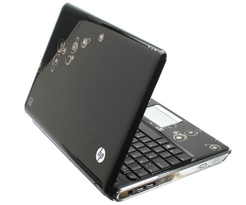 HP Pavilion dv3 laptop with open lid and logo visible.