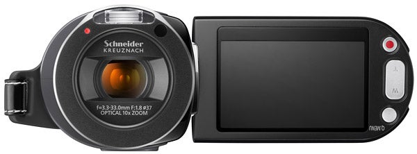 Samsung HMX-H104 camcorder with lens and display open.