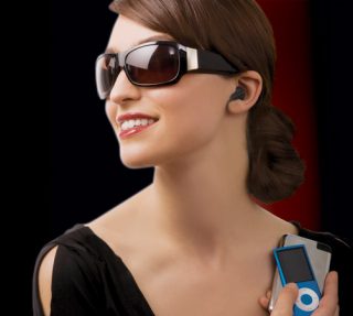 Woman wearing TriSpecs Bluetooth Headset Sunglasses with MP3 player.