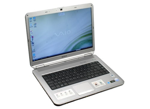 Sony VAIO VGN-NS20E/S laptop open on a white surface.