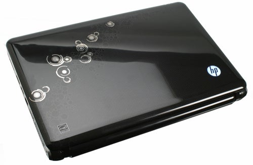 HP Pavilion dv3-2050ea laptop with a black cover design.