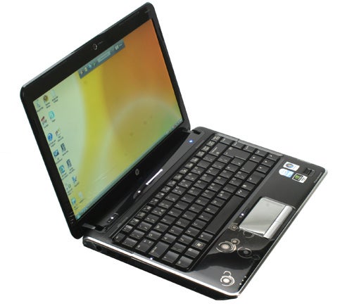 HP Pavilion dv3-2050ea laptop with screen turned on.