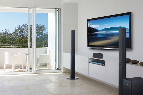 Panasonic home cinema system setup in a bright living room.