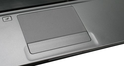 Close-up of Acer Aspire Timeline 4810T trackpad and keyboard area.