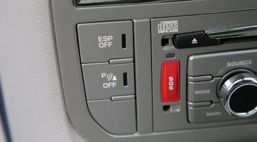 Close-up of Citroen C5 dashboard controls and SOS button.