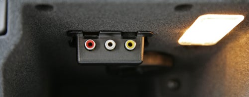 Close-up of Citroen C5 auxiliary input connectors.Citroen C5 multimedia interface screen displaying AUX input option.