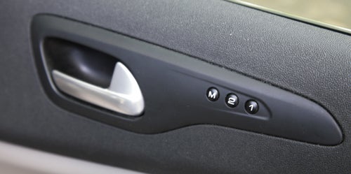 Close-up of Citroen C5 memory seat adjustment buttons.