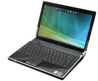 Dell Studio XPS M1340 laptop on white background.