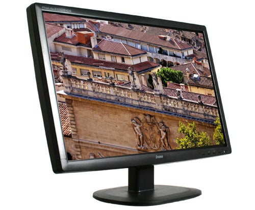 Iiyama ProLite E2209HDS monitor displaying vibrant cityscape.