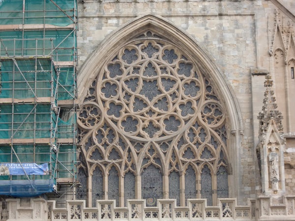 Cathedral facade with intricate stone window design.