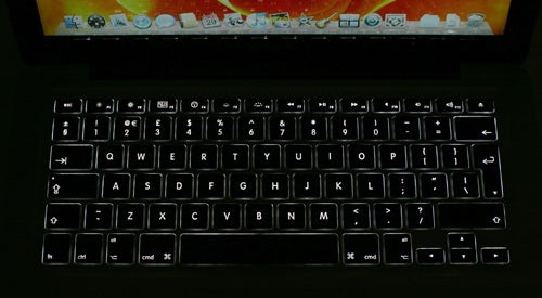 Close-up of 2009 MacBook Pro keyboard and screen.