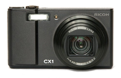 Ricoh CX1 digital camera front view on white background.