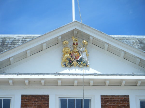 Photograph of a crest on a building gable taken with FinePix Z30.