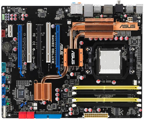Asus M4N82 Deluxe motherboard with heatpipes and expansion slots.