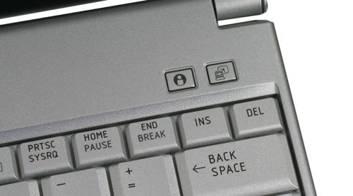 Close-up of Toshiba Portege A600 laptop keyboard and hinges.
