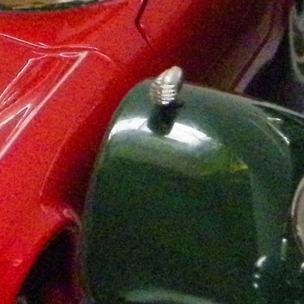 Close-up of a red object with a background.